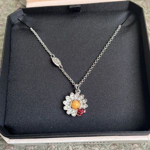 Juicy couture flower and 🐞 pendant